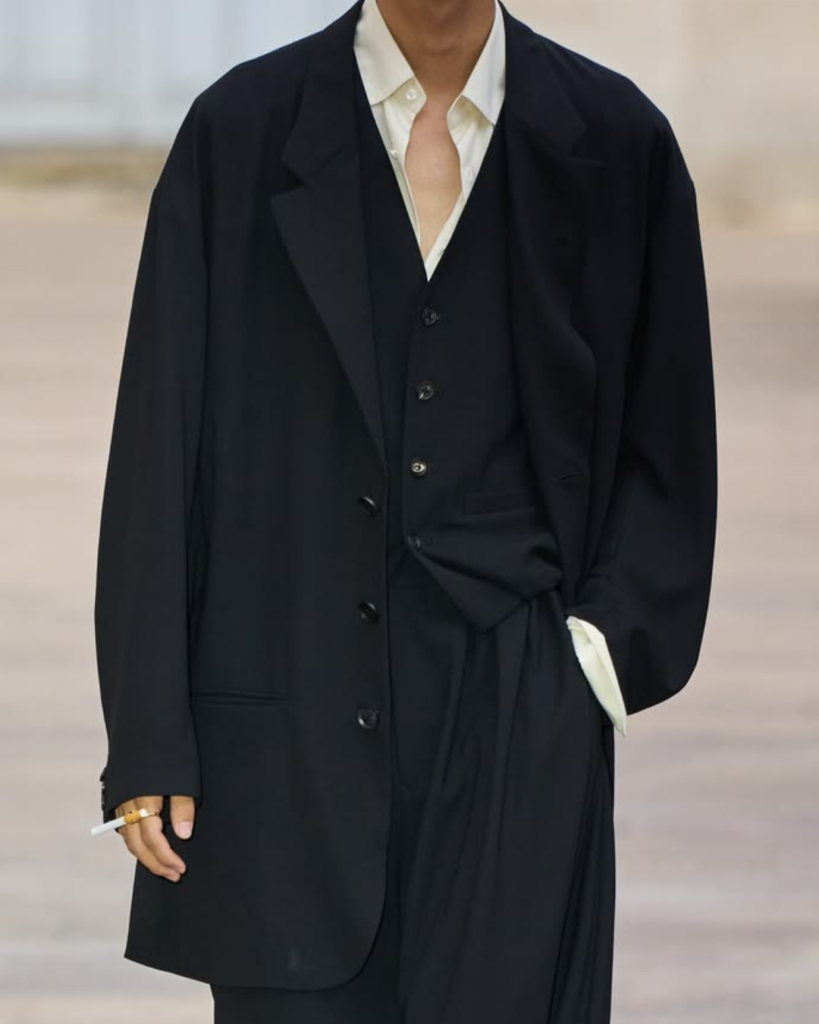 SOSHIOTSUKI Spring Summer 2027 menswear collection showing Japanese reinterpretation of European tailoring with relaxed suits and cultural references