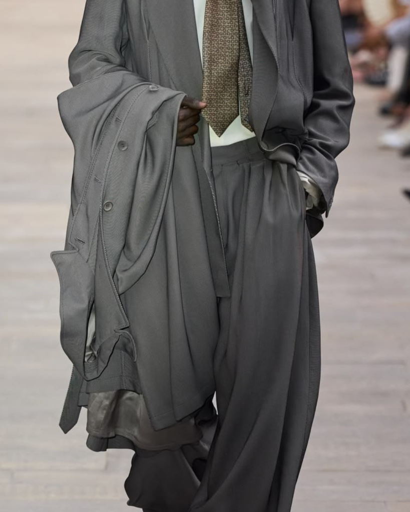 SOSHIOTSUKI SS27 Close-up of contemporary menswear tailoring showing textured fabrics, softened construction, and refined craftsmanship GREY SUIT